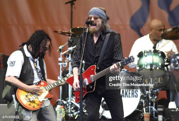 Mike Campbell, Tom Petty, and Steve Ferrone of Tom Petty and The Heartbreakers perform during the 2017 New Orleans Jazz & Heritage Festival at Fair...