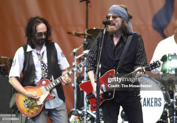 Mike Campbell and Tom Petty of Tom Petty and The Heartbreakers perform during the 2017 New Orleans Jazz & Heritage Festival at Fair Grounds Race...