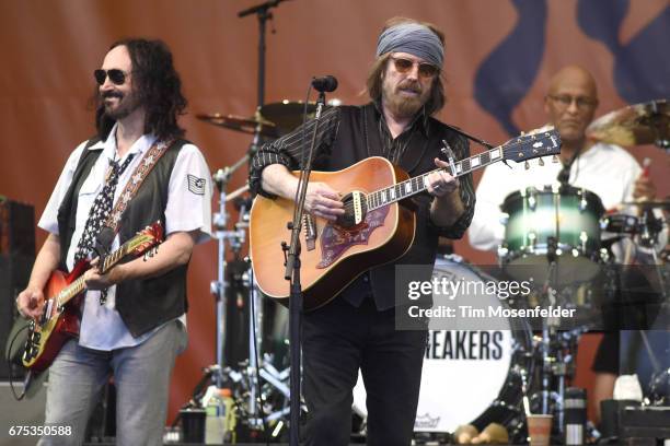 Mike Campbell, Tom Petty, and Steve Ferrone of Tom Petty and The Heartbreakers perform during the 2017 New Orleans Jazz & Heritage Festival at Fair...