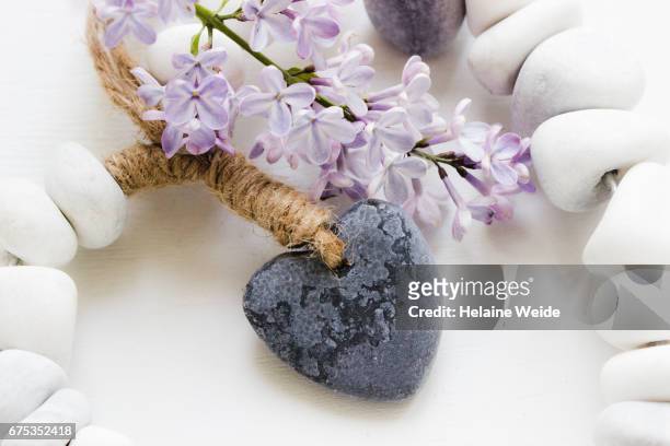heart with lilac and stones - imagine gala 2017 stock pictures, royalty-free photos & images