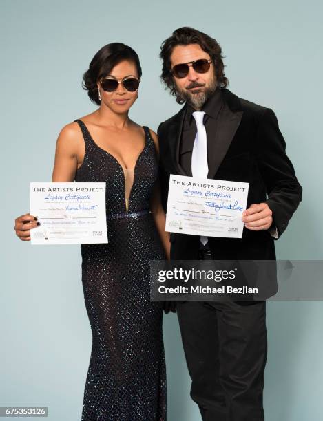 Vinessa Antoine and Jeffrey Vincent Parise pose with Foster Grant Sunglasses at The 44th Daytime Emmy Awards - Portraits by The Artists Project...