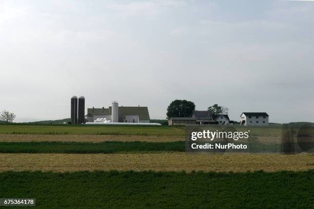 Typical Lancaster County farm, seen from the window of an Amtrak Keystone Service heading to Philadelphia, PA on April 30, 2017. Diminishing retail,...