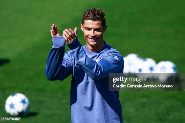 Cristiano Ronaldo of Real Madrid CF claps druing a training session ahead of the UEFA Champions League Semifinal First leg match between Real Madrid...