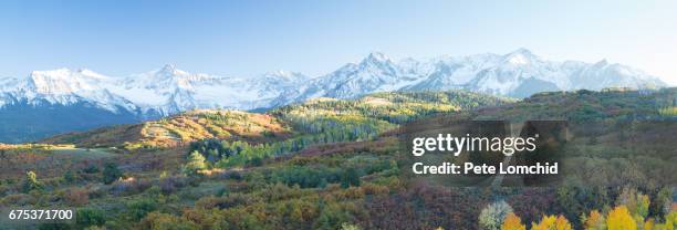 panorama san juan mountains and aspen trees in fall color at sunrise, dallas divide, ouray - falls texas stock pictures, royalty-free photos & images