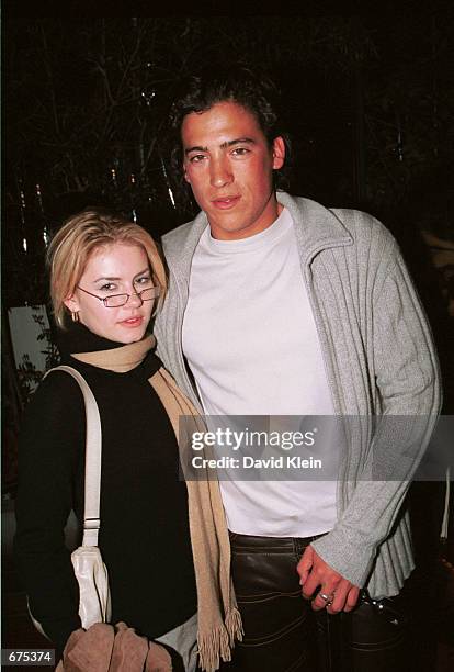 Actors Elisha Cuthbert and Andrew Keegan arrive at "My VH1 Music Awards" after party at Ago restaurant December 2, 2001 in West Hollywood, CA.