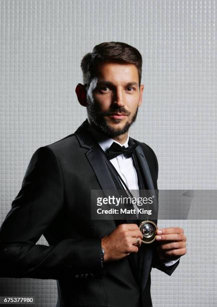 Milos Ninkovic of Sydney FC poses with the Johnny Warren Medal during the FFA Dolan Warren Awards at The Star on May 1, 2017 in Sydney, Australia.