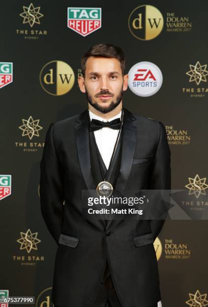 Milos Ninkovic of Sydney FC poses with the Johnny Warren Medal during the FFA Dolan Warren Awards at The Star on May 1, 2017 in Sydney, Australia.