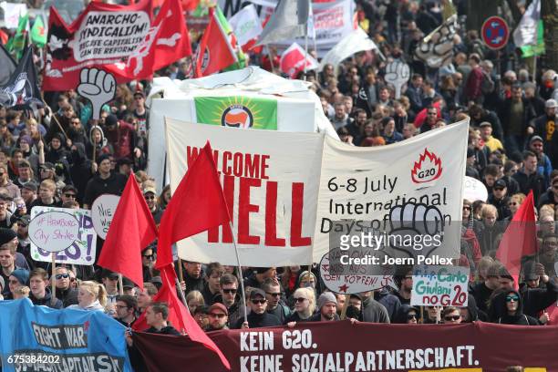 Leftist protesters carrying signs condemning the upcoming G20 summit march in annual May Day demonstrations on May 1, 2017 in Hamburg, Germany....