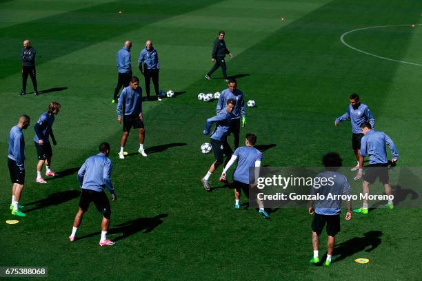 Cristiano Ronaldo of Real Madrid CF excersises with his teammates druing a training session ahead of the UEFA Champions League Semifinal First leg...