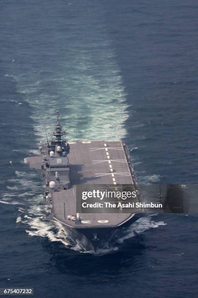 In this aerial image, Japan Maritime Self-Defense Force escort vessel Izumo cruises off Boso Peninsula on May 1, 2017 in at sea. In the first such...