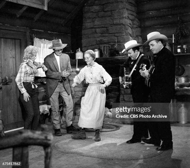 The Beverly Hillbillies The Beverly Hillbillies episode: Flatt, Clampett, and Scruggs. Pictured from left is Donna Douglas , Buddy Ebsen , Irene Ryan...