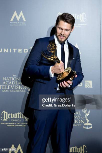 Actor Scott Clifton displays his Emmy Award at the 44th Annual Daytime Emmy Awards at Pasadena Civic Auditorium on April 30, 2017 in Pasadena,...