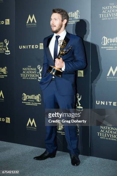Actor Scott Clifton displays his Emmy Award at the 44th Annual Daytime Emmy Awards at Pasadena Civic Auditorium on April 30, 2017 in Pasadena,...