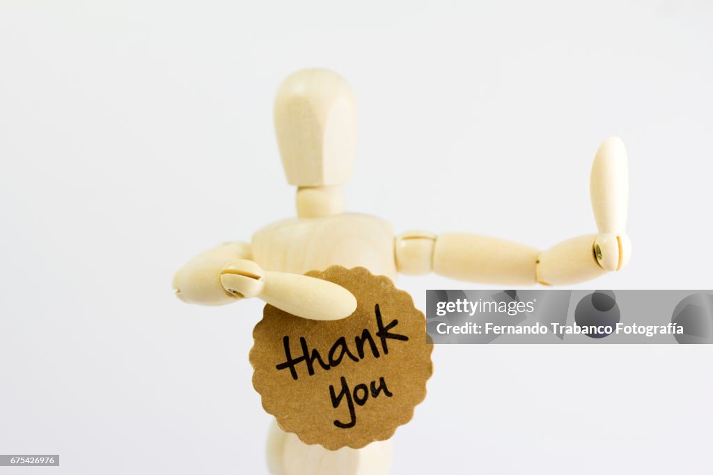 Articulated doll delivers a thank you card