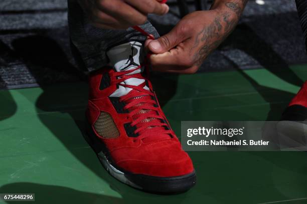 Milwaukee, WI P.J. Tucker of the Toronto Raptors ties his shoes before Game Six of the Eastern Conference Quarterfinals against the Milwaukee Bucks...