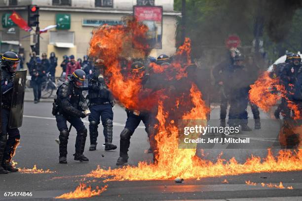 Demonstrators confront police on the annual May Day worker's march on May 1, 2017 in Paris, France. Police dealt with violent scenes in central Paris...