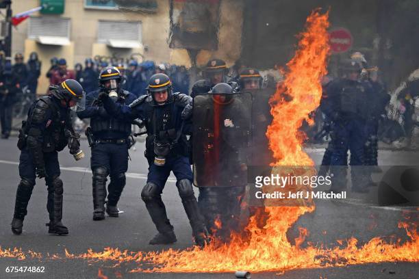 Demonstrators confront police on the annual May Day worker's march on May 1, 2017 in Paris, France. Police dealt with violent scenes in central Paris...
