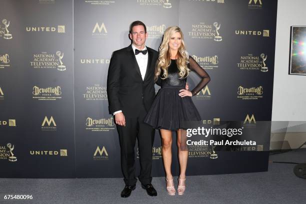 Personalities Tarek El Moussa and Christina El Moussa attend the press room for the 44th annual Daytime Emmy Awards at Pasadena Civic Auditorium on...