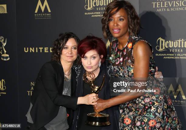 Personalities Sara Gilbert, Sharon Osbourne and Aisha Tyler attend the press room for the 44th annual Daytime Emmy Awards at Pasadena Civic...