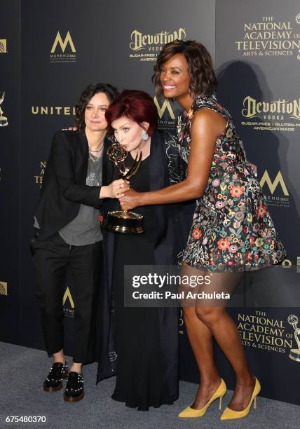 Personalities Sara Gilbert, Sharon Osbourne and Aisha Tyler attend the press room for the 44th annual Daytime Emmy Awards at Pasadena Civic...