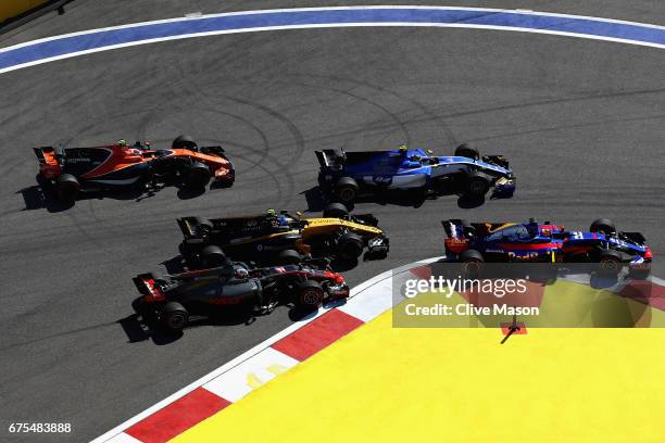 Daniil Kvyat of Russia driving the Scuderia Toro Rosso STR12, Pascal Wehrlein of Germany driving the Sauber F1 Team Sauber C36 Ferrari, Jolyon Palmer...