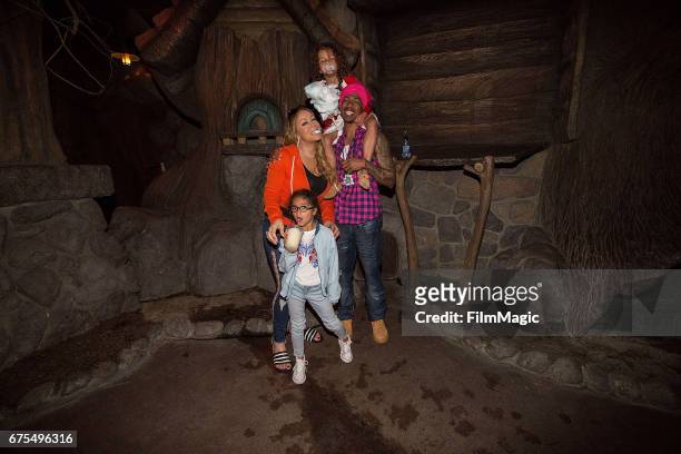 Monroe Cannon, Mariah Carey, Moroccan Cannon, and Nick Cannon prepare to ride Splash Mountain at Disneyland on April 30, 2017 in Anaheim, California.