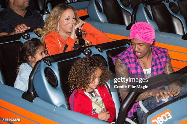 Monroe Cannon, Moroccan Cannon, Mariah Carey, and Nick Cannon ride Space Mountain at Disneyland on April 30, 2017 in Anaheim, California.