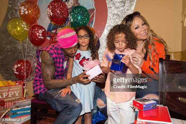 Nick Cannon, Monroe Cannon, Moroccan Cannon, and Mariah Carey celebrate the twins birthday at Disneyland on April 30, 2017 in Anaheim, California.