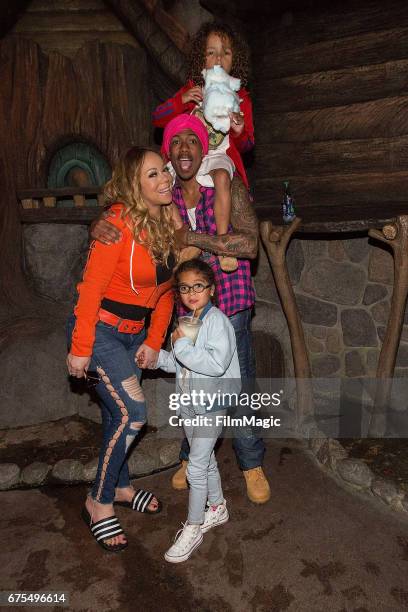 Mariah Carey, Nick Cannon, Moroccan Cannon, and Monroe Cannon prepare to ride on Splash Mountain at Disneyland on April 30, 2017 in Anaheim,...