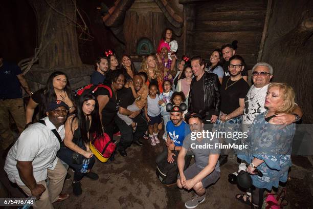 Mariah Carey and Nick Cannon pose with family and friends outside Splash Mountain at Disneyland on April 30, 2017 in Anaheim, California.
