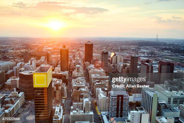 mayfair and selby districts of johannesburg city centre at sunset - south africa aerial stock pictures, royalty-free photos & images