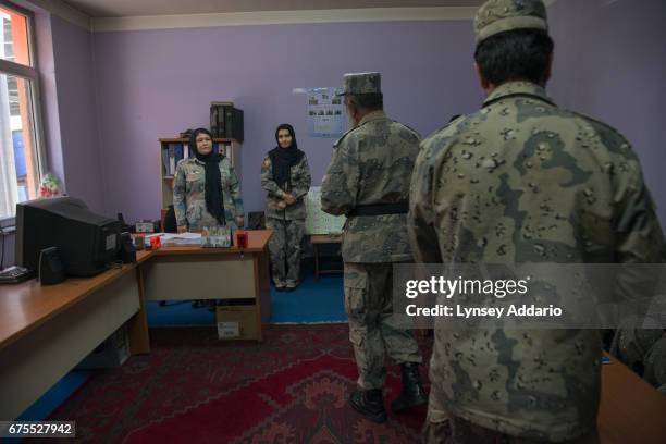 Afghan women from across Afghanistan work at the headquarters of the Border Police in Kabul, Afghanistan, June 22, 2013. The United States has spent...