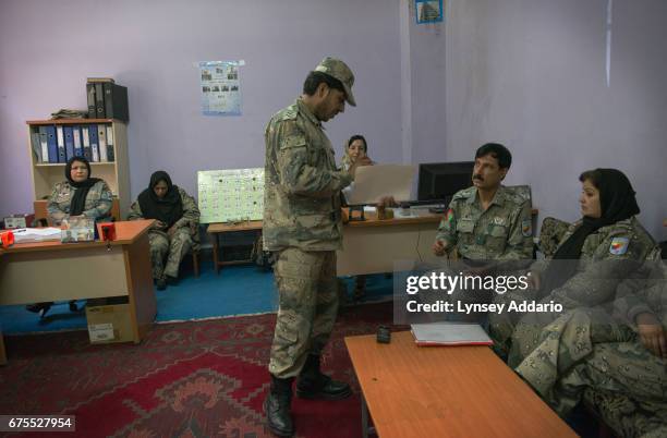 Afghan women from across Afghanistan work at the headquarters of the Border Police in Kabul, Afghanistan, June 22, 2013. The United States has spent...
