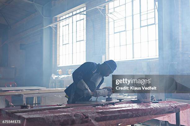 man polishing marble slab at factory - sand plants stock pictures, royalty-free photos & images