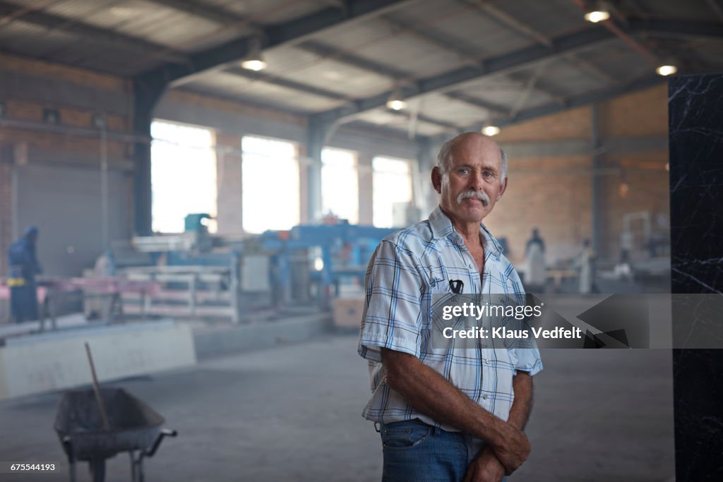 Portrait of owner at stone factory