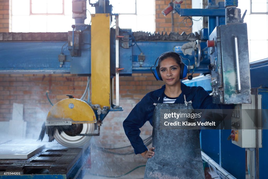 Portrait of female worker at stone factory