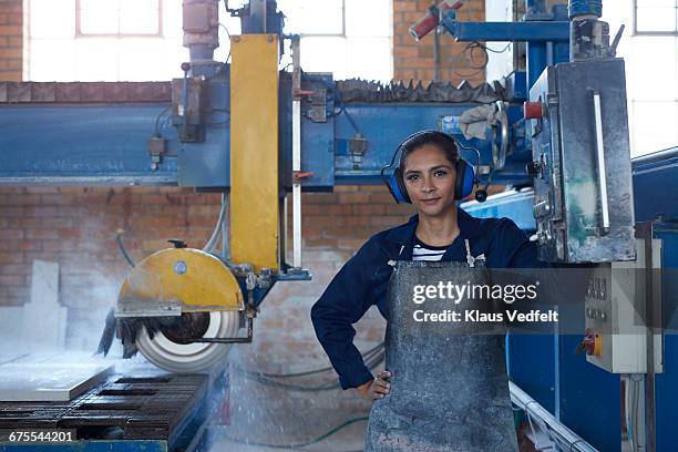 portrait of female worker at stone factory - tough stock pictures, royalty-free photos & images