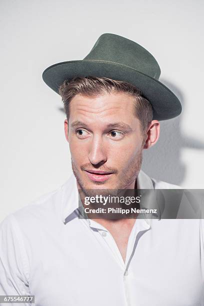 portrait of young men with hat - philipp nemenz foto e immagini stock