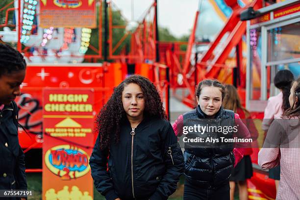 portrait of teenage girls at fun fair - unfilteredtrend stock pictures, royalty-free photos & images