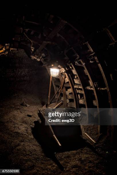 coal excavation with shovels and a wheelbarrow - coal mine stock pictures, royalty-free photos & images