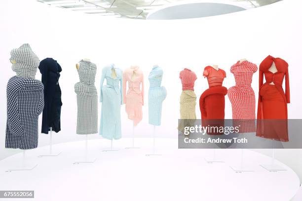 Dresses on display during "Rei Kawakubo/Comme des Garcons: Art Of The In-Between" Costume Institute Gala press preview at Metropolitan Museum of Art...