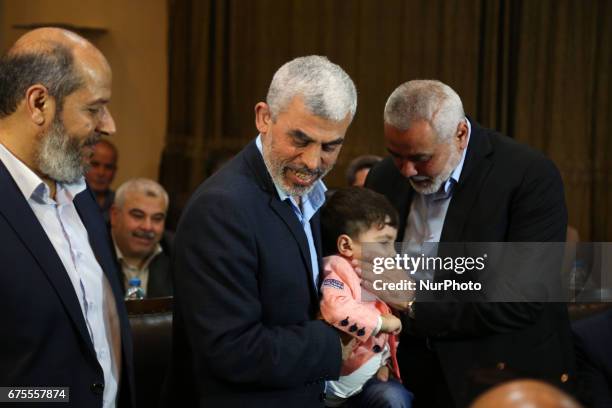 Hamas leader Ismail Haniyeh and Hamas Gaza Chief Yehya Al-Sinwar attend a ceremony announcing a new policy document, in Gaza City May 1, 2017.