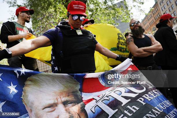 Pro-Donald Trump group demonstrates across the street from hundreds of liberal protesters in Union Square on May Day on May 1, 2017 in New York City....