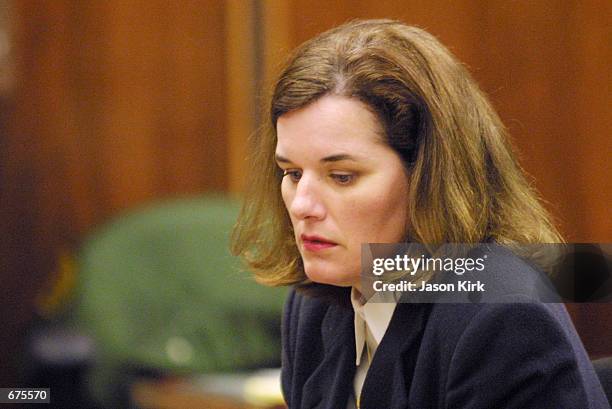 Comedienne Paula Poundstone takes a moment at the Santa Monica Superior Court December 5, 2001 in Santa Monica, CA. Judge Bernard J. Kamins ruled...