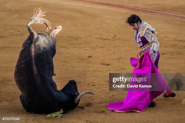 Bullfighter Cayetano Rivera Ordonez performs with a Daniel Ruiz ranch fighting bull at La Maestranza bullring on the second day of La feria de Abril...