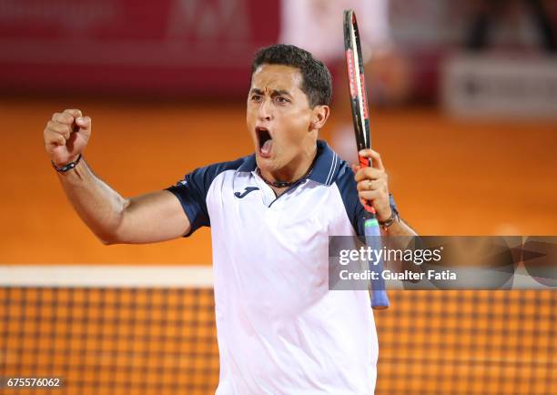 Nicolas Almagro celebrates winning the match point at the end of the match between Kyle Edmund from Great Britain/Joao Sousa from Portugal and...
