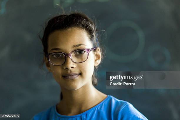 Close-up of cute girl wearing eyeglasses