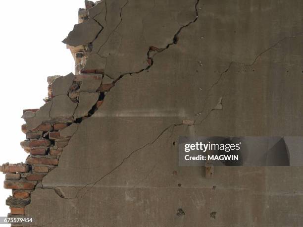 broken grey wall with bricks,on white background - broken bricks stock pictures, royalty-free photos & images