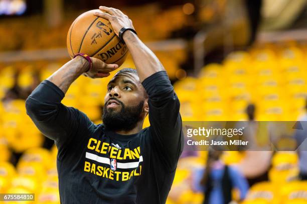 Kyrie Irving of the Cleveland Cavaliers warms up prior to Game One of the NBA Eastern Conference semifinals against the Toronto Raptors at Quicken...