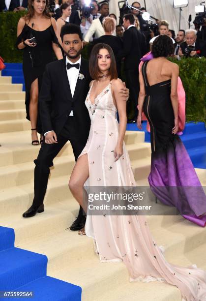 Recording artists The Weeknd and Selena Gomez attend "Rei Kawakubo/Comme des Garcons: Art Of The In-Between" Costume Institute Gala at Metropolitan...